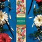 Front of Exotica Agarbatti Box surrounded by flowers and petals