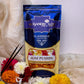 Agni Pushpa Agarbatti Pouch surrounded by flowers and petals