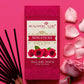 Gulabi Maya Agarbatti Mini Sticks Box surrounded by rose petals