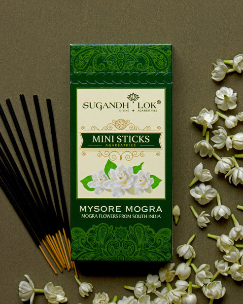 Mysore Mogra Agarbatti Mini Sticks Box surrounded by mogra flowers