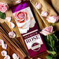 Premium Rose Agarbatti Pack surrounded by pink roses & petals