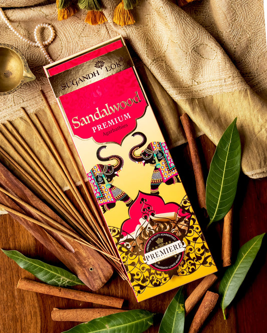 Sandalwood Premium Agarbatti Pack surrounded by sandalwood sticks