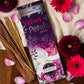 Velvet Petals Agarbatti Pack surrounded by flowers and Petals