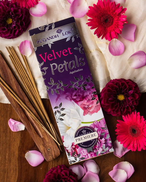 Velvet Petals Agarbatti Pack surrounded by flowers and Petals